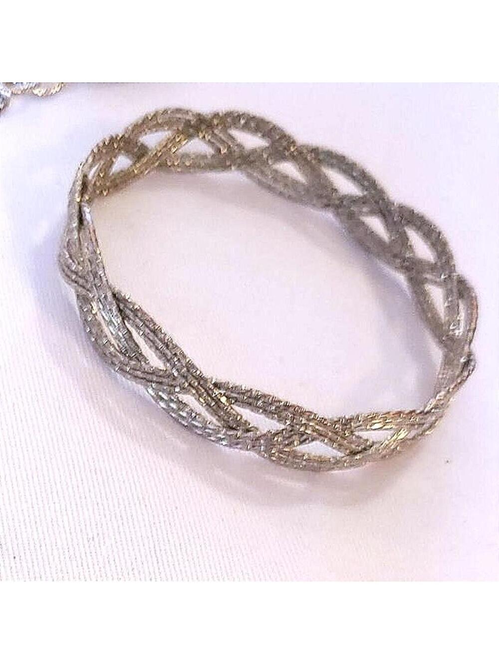 Silver tone braided bangle bracelet